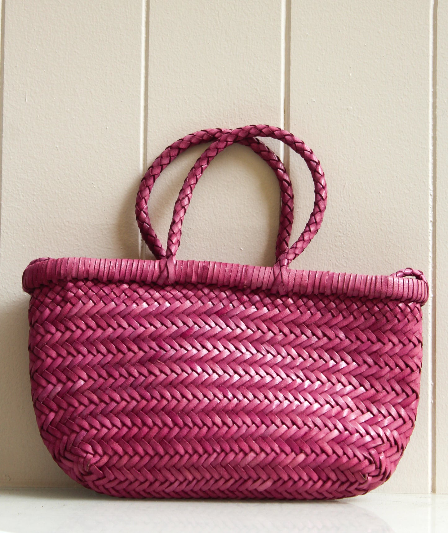 BORSA IN PELLE INTRECCIATA ROSA CON TRACOLLA