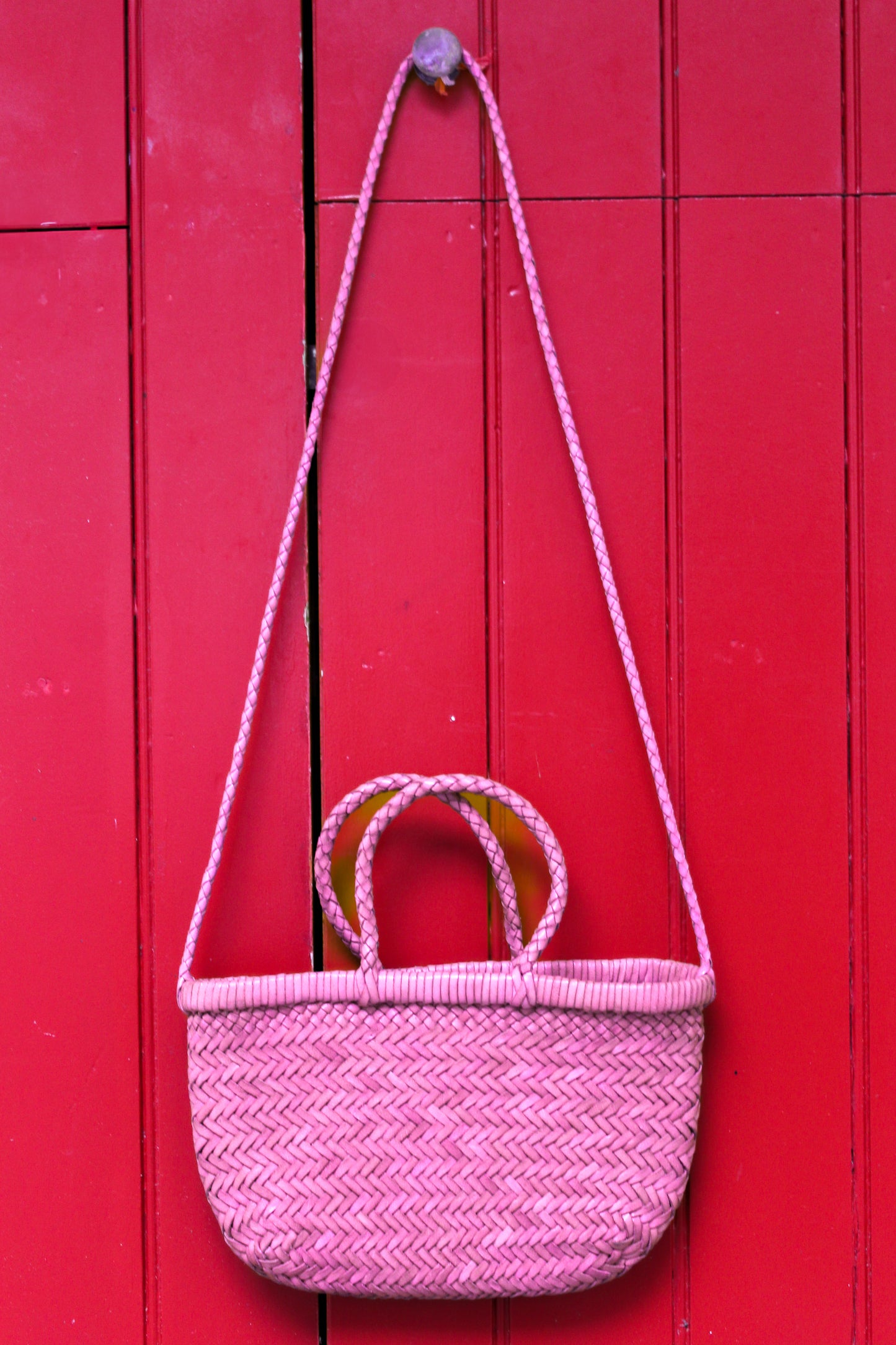 BORSA IN PELLE INTRECCIATA ROSA CON TRACOLLA